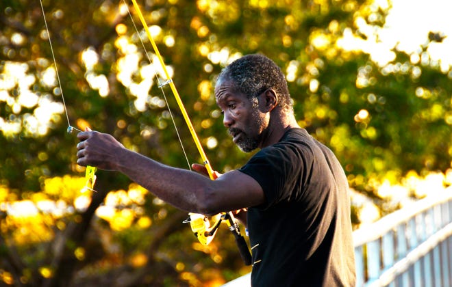 Cocoa resident Simon Jefferson was enjoying the beautiful weather of late afternoon, while fishing under the Hubert H. Humphrey Bridge that connects Cocoa to Merritt Island over the Indian River Lagoon.