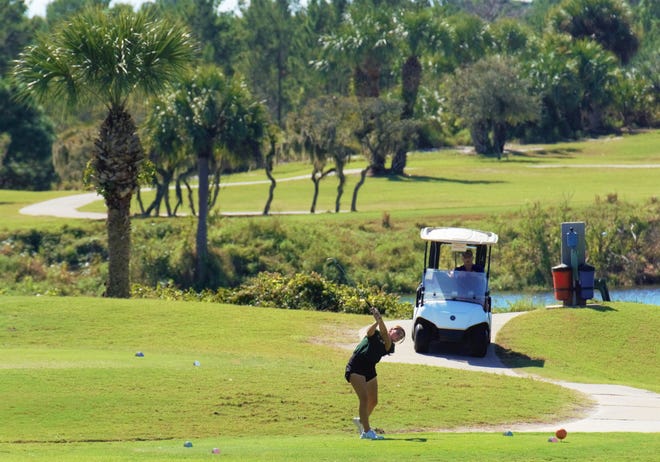 Viera's Hannah Hall hits her tee shot on the 14th hole during the girls golf District 8-3A Championship on Wednesday, October 26, 2022 on the Dunes Course at Sandridge Golf Club in Vero Beach.