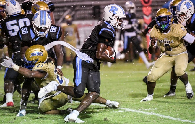 Jaylen Heyward of Rockledge runs the ball through the Osceola defense during their game Friday, September 23, 2022. Craig Bailey/FLORIDA TODAY via USA TODAY NETWORK