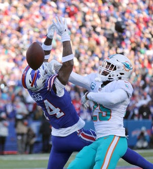 Dolphins Xavien Howard breaks up this deep pass intended for Bills receiver Stefon Diggs.