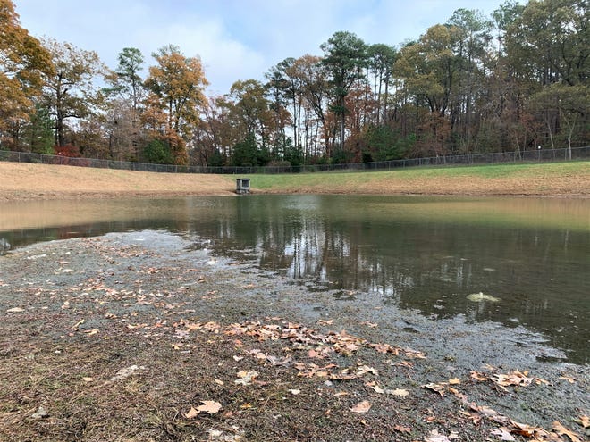 The water retention pond adjacent to the Walmart Supercenter in Fruitland, Maryland, is getting a high-tech retrofit designed to combat Chesapeake Bay pollution. The pond is shown Nov. 19, 2019, prior to the technology's installation.