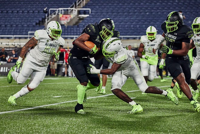 Dozens of the nation's premier 2023 college football recruits battled head-to-head Tuesday at the Under Armour Next All-America Game in Orlando.