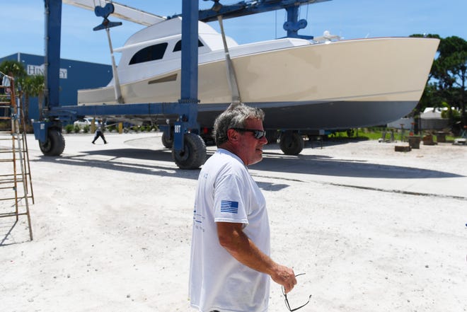 Capt. Jeff Frank, of Houston, looks on as the famed sportfishing boat Sea Lion II is moved from dry dock the the water for the first time in more than two years on Thursday, June 25, 2020, at Hinckley Yacht Services in Port Salerno. The boat, which made appearances on several television shows and hosted the likes of Bing Crosby and former President Richard Nixon, sank in the Indian River Lagoon during Hurricane Irma in September 2017.