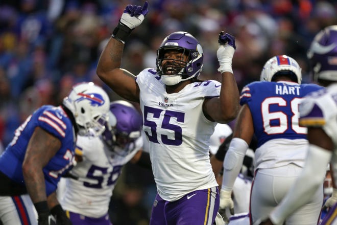 Minnesota Vikings linebacker Za'Darius Smith (55) celebrates as his team takes the lead over the Buffalo Bills in the second half of an NFL football game, Sunday, Nov. 13, 2022, in Orchard Park, N.Y. (AP Photo/Joshua Bessex)