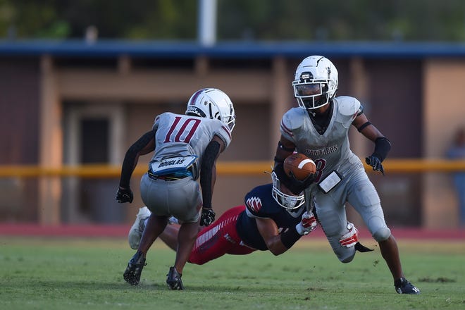 Westwood's Jaylyn Monds (8) runs the ball during a preseason game against Forest Hill High School at Lawnwood Stadium in Fort Pierce on Friday, August 19, 2022.
