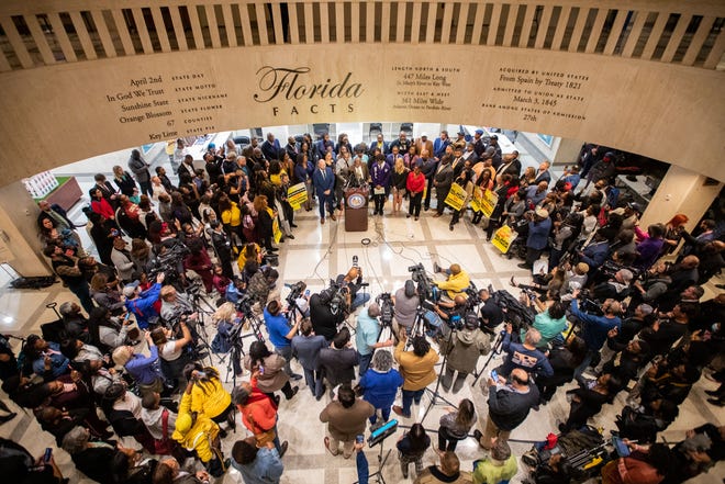 A large crowd gathered in the Florida Capitol fourth floor rotunda for the ÒStop the Black AttackÓ rally Wednesday, Jan. 25, 2023. Attorney Ben Crump threatened to file a lawsuit against Gov. Ron DeSantis and his administration and the ban of a proposed Advanced Placement course on African America Studies in Florida High schools on behalf of three Leon County school students.