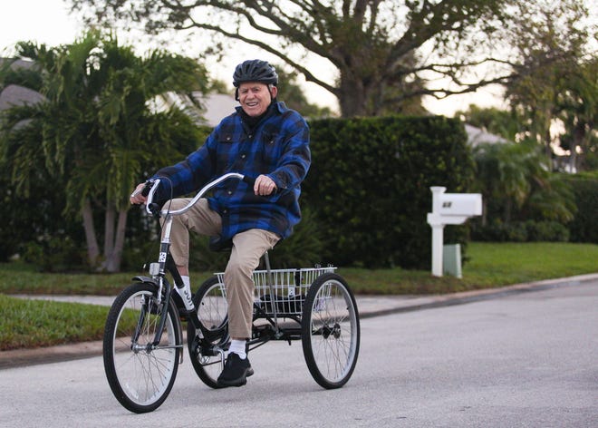 Floyd York, 99, rides his tricycle around his Cache Cay neighborhood in Vero Beach on Monday, Jan. 10, 2023 at sunrise where he begins his mornings every day.