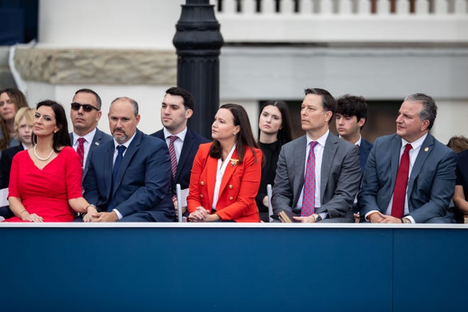 Lt. Gov. Jeanette Nu–ez, left, Attorney General Ashley Moody, center and CFO Jimmy Patronis, right, listen to Gov. Ron DeSantis address the audience at his inauguration ceremony Tuesday, Jan. 3, 2023.