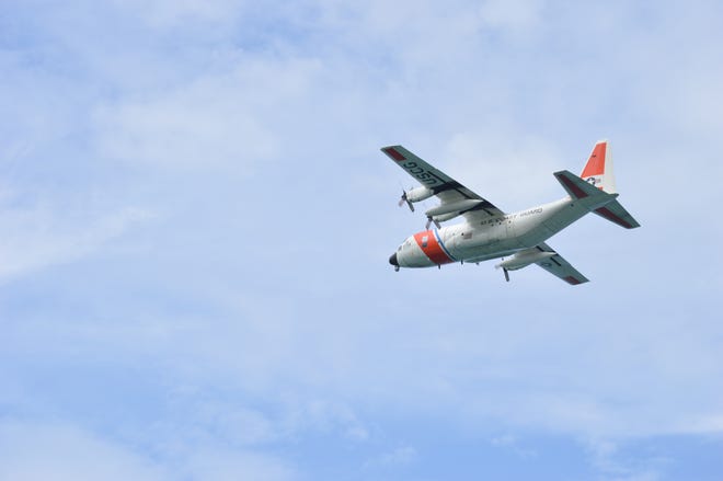 A U.S. Coast Guard plane flying in the search for a missing Indian River County kayaker in 2021.