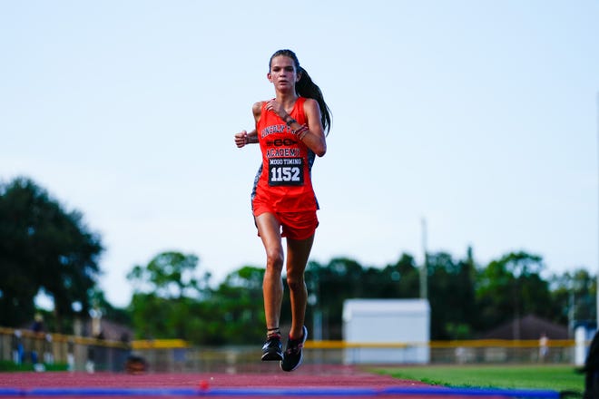 Lincoln Park’s Jacey Lane finishes first in the Wayne Cross Invitational on Wednesday, Aug. 31, 2022 at Lawnwood Stadium in Fort Pierce. Jacey won with a time of 20:37.60.