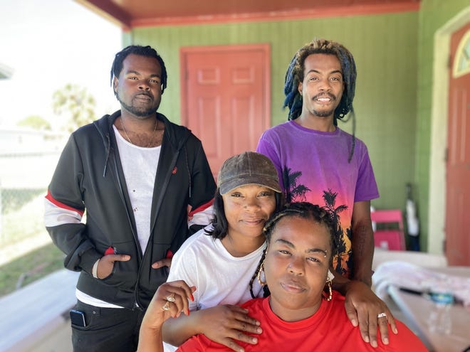 Family members of Nikkitia Bryant photographed Jan. 19, 2023. Trejavious Bryant (back left), Latara Nedd-Smith (center wearing hat), Nikkiti White (in red shirt), Alonzo Jefferson (back right)