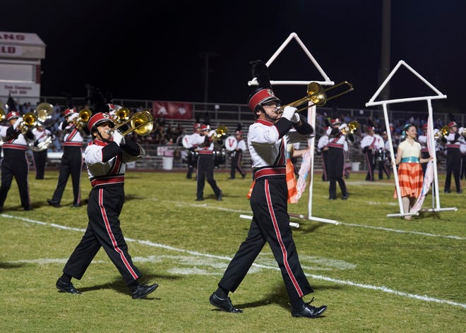 Vero Beach High School marching band and color guard perform during the 41st annual Crown Jewel Marching Band Festival on Saturday, Oct. 8, 2022, at Vero Beach High School. The Crown Jewel is one of the oldest continuous marching festivals in Florida.
