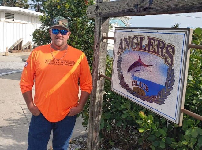 Anthony Petracca outside the Anglers Club, where he has bragging rights among the club's most serious anglers for the coming year.