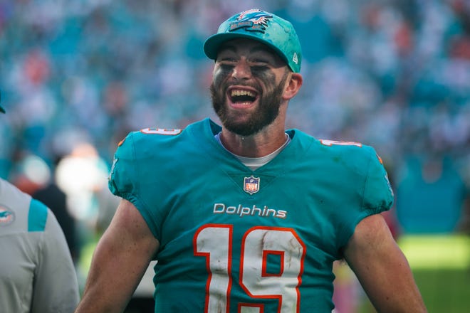 Dolphins quarterback Skylar Thompson celebrates the victory over the Jets.