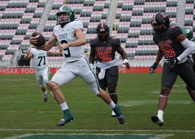 Quarterback Brooks Bentley (9) of Venice scores a touchdown in the first quarter against Lakeland during the Class 4S state championship game at DRV PNK Stadium, Saturday, Dec. 17, 2022 in Fort Lauderdale.