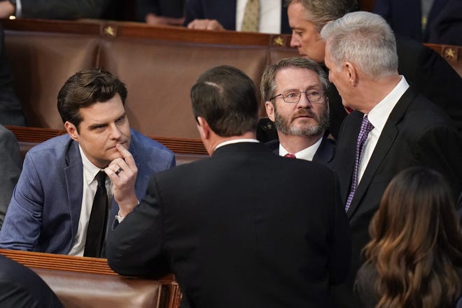 Rep. Kevin McCarthy, R-Calif., right, walks past Rep. Matt Gaetz, R-Fla., as he arrives in to the House chamber as the House meets for a second day to elect a speaker and convene the 118th Congress in Washington, Wednesday, Jan. 4, 2023.