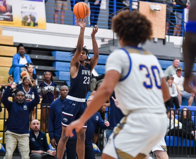 Dwyer's Blake Wilson (23) goes for a 3-point basket against Martin County in a boys high school basketball game, Wednesday, Jan. 18, 2023, at Martin County High School in Stuart. Dwyer won 53-52.