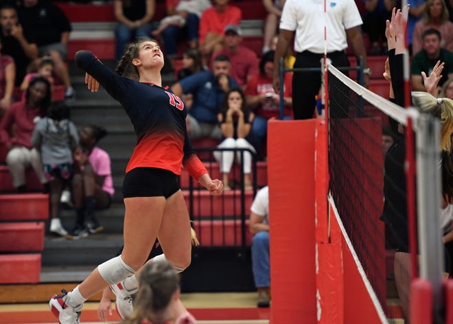 Vero Beach's Madison Gravlee (15) hits the ball to Jupiter's side of the net in a high school volleyball match on Tuesday, Aug. 30, 2022 at Vero Beach High School.