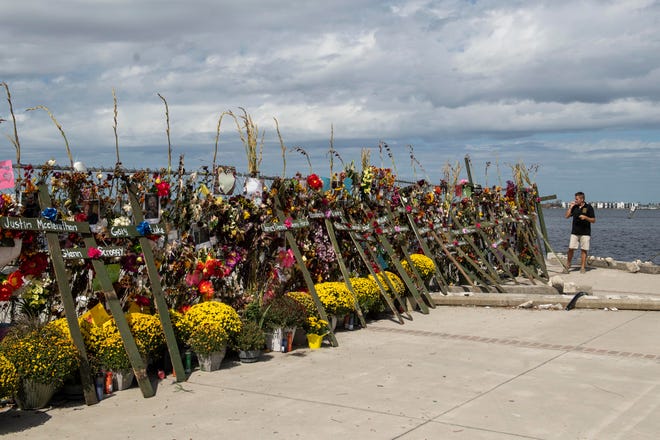 A memorial for Hurricane Ian victims has at Centennial Park in Fort Myers, Fla. on Sunday, October 9, 2022.