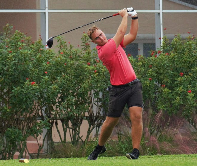Morningside Academy's Jules Gentil hits his tee shot on the eighth hole during Monday's District 13-1A Championship at the Champions Club at Summerfield in Stuart on Oct. 24, 2022.