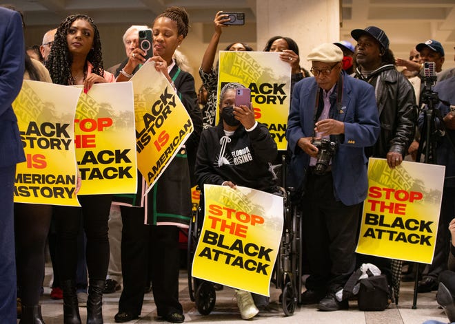 A large crowd gathered in the Florida Capitol fourth floor rotunda for the ÒStop the Black AttackÓ rally Wednesday, Jan. 25, 2023. Attorney Ben Crump threatened to file a lawsuit against Gov. Ron DeSantis and his administration and the ban of a proposed Advanced Placement course on African America Studies in Florida High schools on behalf of three Leon County school students.