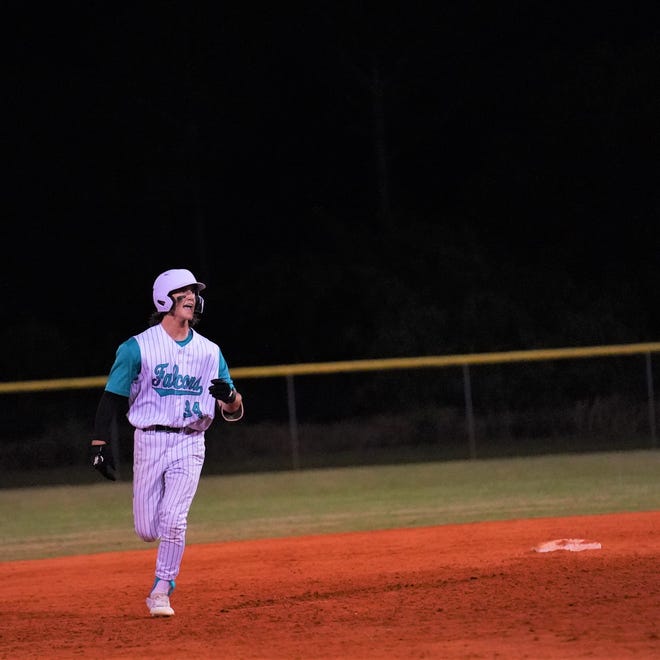 Jensen Beach's Connor Cantillo rounds the bases after hitting a two-run home run in the fifth inning against Centennial on Wednesday, Feb. 22, 2023 in Jensen Beach. The Eagles won the game 4-2.