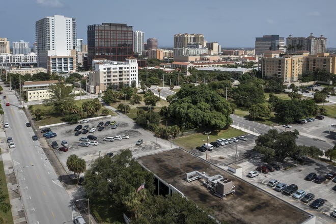 This Aug. 24, 2021 photo shows Datura Street, left and Evernia Street, right, in West Palm Beach, Fla. In back-to-back, unanimous votes, commissioners in Palm Beach County and West Palm Beach approved preliminary plans to have the University of Florida open a campus near downtown, a move supporters described as "historic" and "transformative."