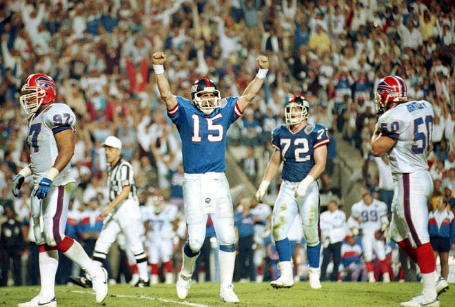 FILE - New York Giants quarterback Jeff Hostetler (15) celebrates a second quarter touchdown against the Buffalo Bills during Super Bowl XXV in Tampa, Fla., in this Jan. 27, 1991 photo. Brock Purdy's bid to join the select group of quarterbacks to go from a backup for most of the season to a Super Bowl starter got derailed when he suffered his own injury in the NFC championship game. There have been several examples of backups leading a team to the big game.   (AP Photo, File)