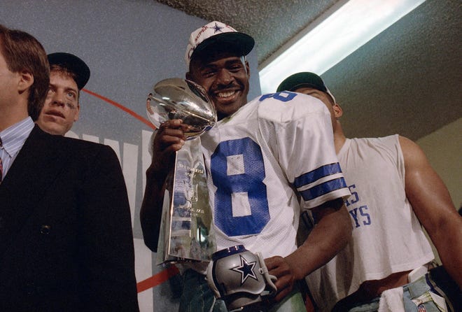 Dallas Cowboys wide receiver Michael Irvin holds the Vince Lombardi Trophy the Cowboys won Super Bowl XXVII against the Buffalo Bills in Pasadena, Calif., in Jan. 1993.