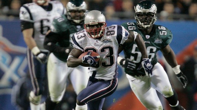 Deion Branch runs with the ball during the Patriots' win over the Eagles in Super Bowl XXXIX.