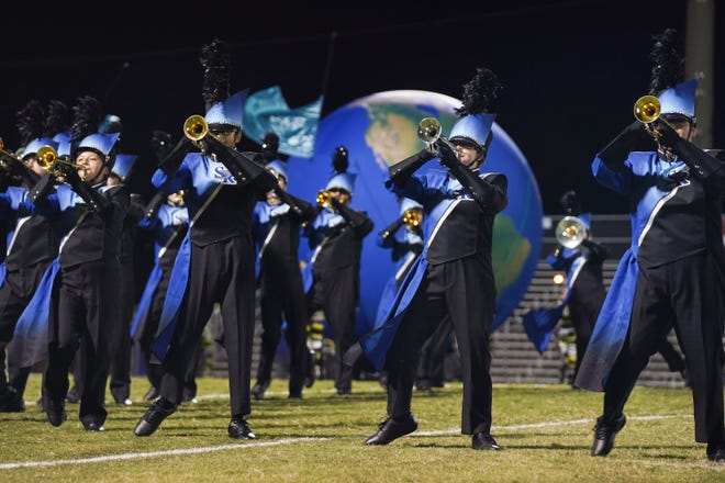 Sebastian River High School marching band and color guard perform during the 41st annual Crown Jewel Marching Band Festival on Saturday, Oct. 8, 2022, at Vero Beach High School. The Crown Jewel is one of the oldest continuous marching festivals in Florida.