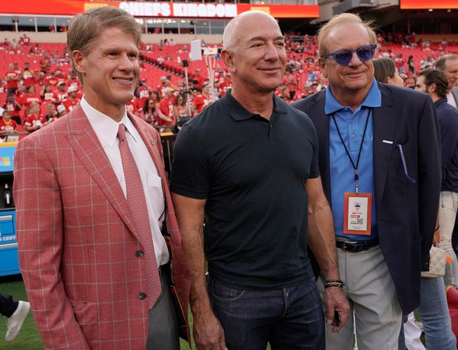 Week 2: Amazon founder Jeff Bezos poses with Kansas City Chiefs owner Clark Hunt (left) and Los Angeles Chargers owner Dean Spanos before the start of the Chargers-Chiefs game.