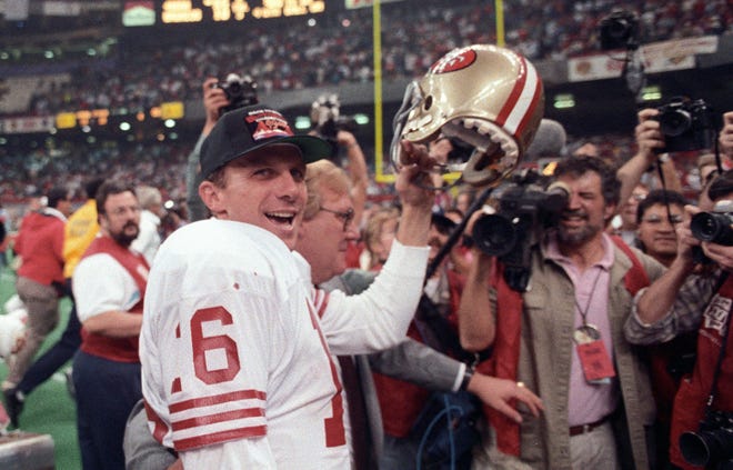 Joe Montana celebrates after winning Super Bowl 24, his fourth and final championship.