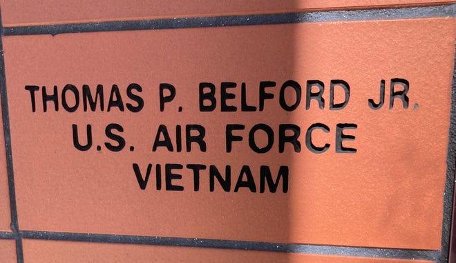 Thomas P. Belford Jr. was a regular at the American Legion Post 318 where this brick photographed Feb. 6, 2023, bears his name.