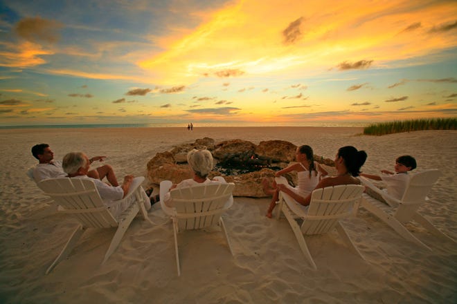 Gather round a fire pit ion the beach for s'mores and sunset watching at Sandpearl Resort in Clearwater.