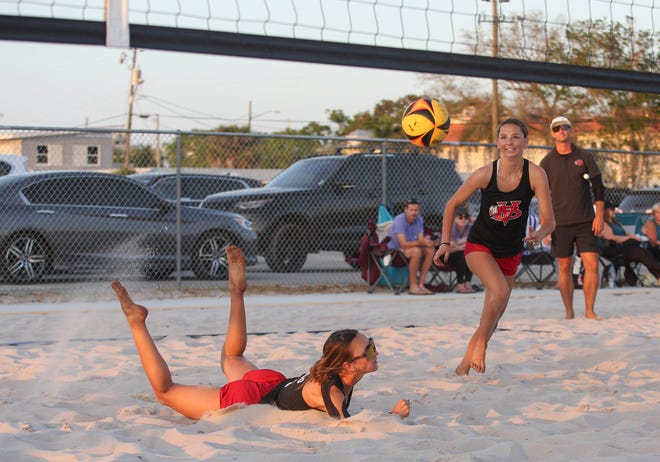 Vero’s Cypress Reinecke (6) dives for the ball with teammate Ava Lilliquist (4) during a beach volleyball game against Jensen Beach on Tuesday, March 7, 2023, at Vero Beach High School. Vero Beach's beach volleyball team took home a 5-0 win over Fort Pierce Central and a 4-1 win over Jensen Beach.