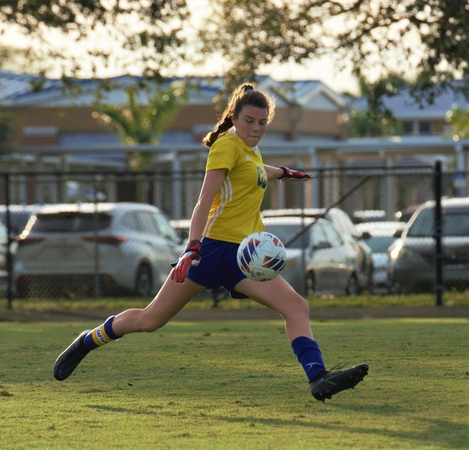 Martin County goalkeeper Dakota Moberg sends the ball downfield during a high school soccer match against Treasure Coast on Tuesday, Nov. 15, 2022 at Martin County High School in Stuart. The Titans won the match 4-0.