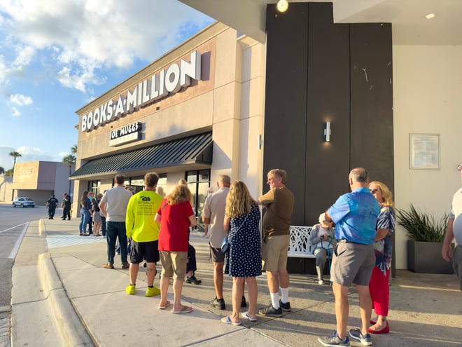 About 100 people wrapped around the Lake Square Mall entrance into Books-a-Million on Tuesday. Ticket holders had a chance to meet Gov Ron DeSantis and get their books signed.