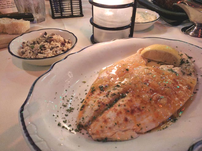 Ocean Grill's pompano with apricot sauce and Southern pecan rice pilaf.
