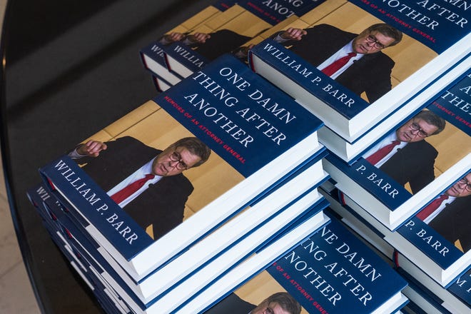 A stack of "One Damn Thing After Another," a book written by former U.S. Attorney General William Barr, are stacked for purchase in the lobby of the Kravis Center for the Performing Arts on Tuesday, March 28, 2023, in downtown West Palm Beach, FL. During his remarks former U.S. Attorney General Barr spoke about his career, time in office during the Trump administration, and also took questions from members of the audience.