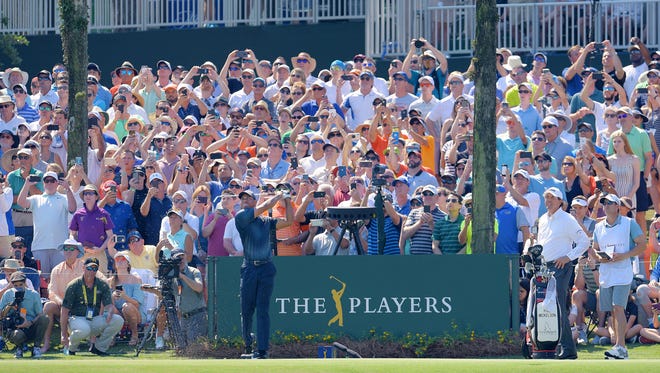 Tiger Wood hits his tee shot at the 17th hole of the Players Stadium Course at TPC Sawgrass during the final round in 2018.