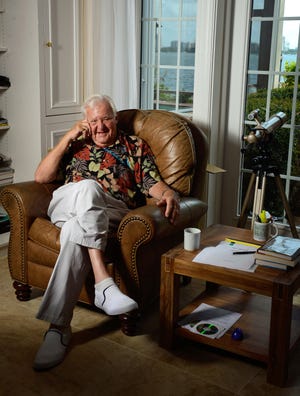 John Jakes, a celebrated author of historical fiction, photographed in his Bird Key home in August, 2013. Jakes died Saturday at age 90.