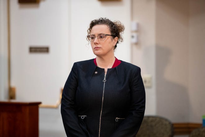 Rep. Erin Grall listens during a press conference in 2021.