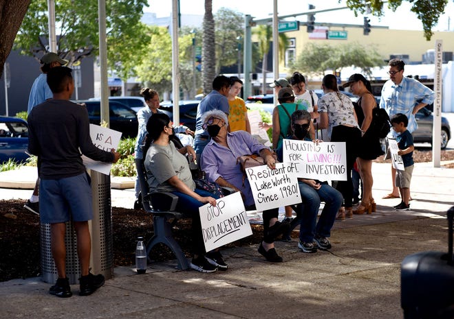 The Guatemalan Maya Center holds a rally on housing affordability at Lake Worth Beach town hall in 2022. Attendees signed a petition to declare a state of emergency regarding housing in Lake Worth Beach.