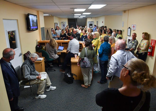 Residents concerned about the 80 books that were removed last month from district school media centers attend the Martin County School Board meeting, Tuesday, March 21, 2023, at 1939 SE Federal Highway in Stuart. Pulitzer Prize winner Toni Morrison and best-selling young-adult novelist Jodi Picoult are some of the writers whose works were removed from the Martin County School District's middle and high schools.