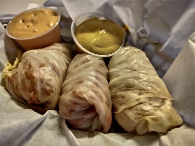 When you order J.J. Manning’s cabbage wraps, you get three large steamed cabbage leaves filled to the brink with nothing but tender, lean and flavorful shredded corned beef brisket, rolled up and served with Thousand Island dressing and spicy mustard for dipping.