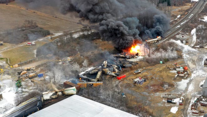 This photo taken with a drone shows portions of a Norfolk Southern freight train that derailed Friday night in East Palestine, Ohio are still on fire at mid-day Saturday, Feb. 4, 2023.