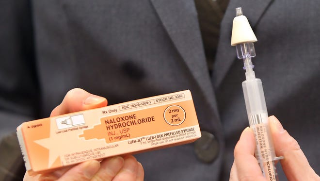 This naloxone kit, an antidote for opioid overdoses shown in a February 2016 photo, includes an atomizer used to administer the drug through the nasal passages.