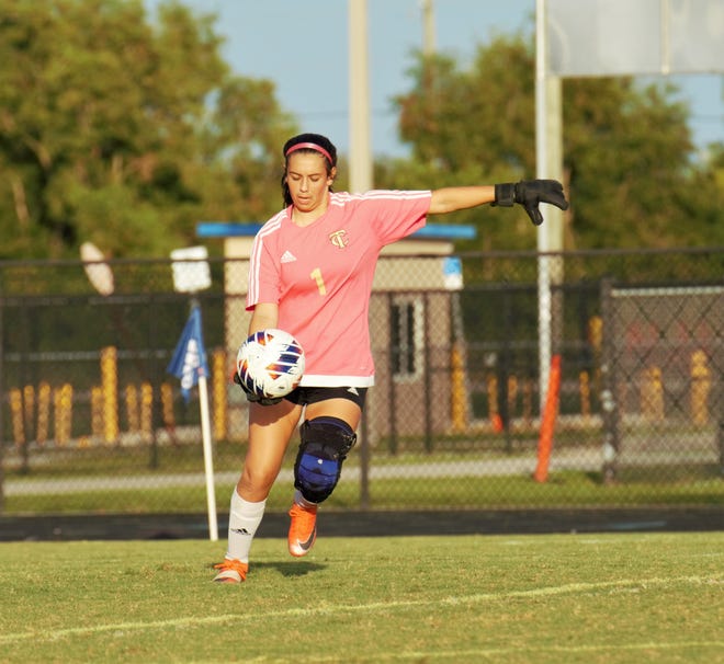 Treasure Coast goalkeeper Kayleigh Marreel sends the ball downfield during a high school soccer match against Martin County on Tuesday, Nov. 15, 2022 at Martin County High School in Stuart. The Titans won the match 4-0.