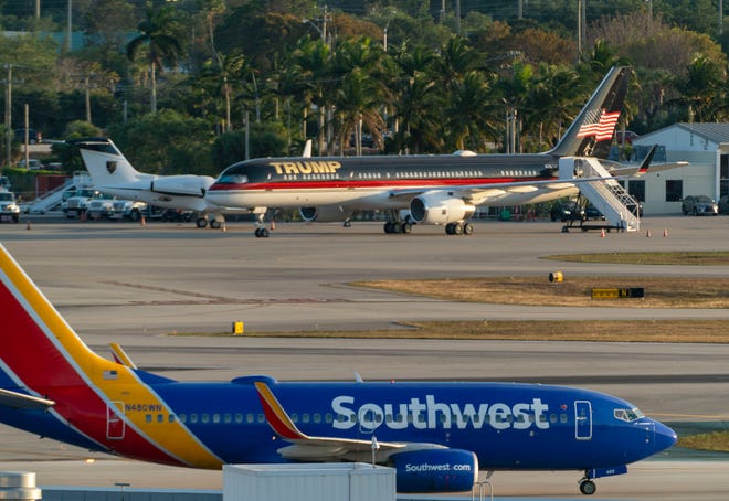 Former president Donald Trump's 757 jet is parked at Palm Beach International Airport in West Palm Beach, Florida on March 30, 2023